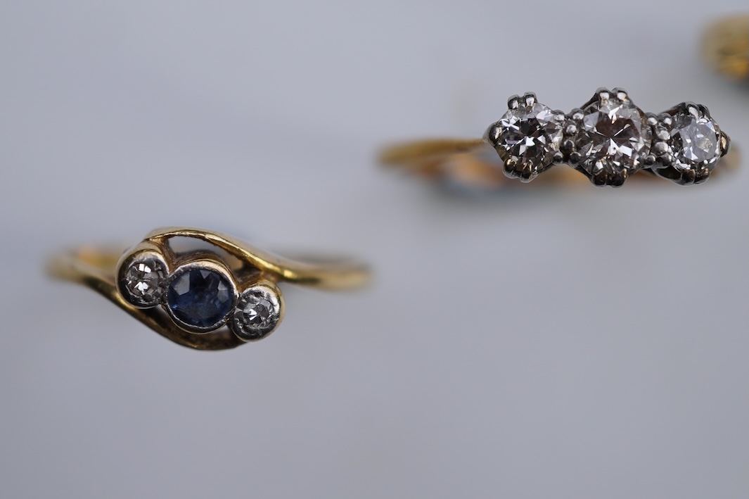 Four gem-set rings